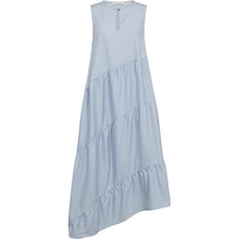 Load image into Gallery viewer, The Dahlia Long Dress is defined by its fluid movement and effortless elegance. Crafted in a soft Kentucky blue hue, the silhouette falls loosely over the body, creating a relaxed yet refined expression.
Size &amp; Fit
• Relaxed, loose fit
• Maxi length
• Sleeveless
• Flowy, A-line silhouette
Details
• Round neckline with keyhole opening
• Asymmetrical hemline
• Lightweight, breathable fabric