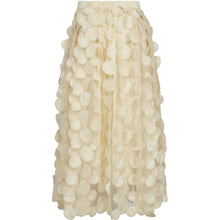 Load image into Gallery viewer, The Donna Dot Skirt is a statement piece defined by texture and dimension. Crafted in a soft oyster white tone, the semi-sheer overlay is adorned with delicate circular appliqués, creating a sculptural, almost three-dimensional effect.
The silhouette falls effortlessly from the waist into a fluid midi length.
Size &amp; Fit
• Regular fit
• Midi length
• Mid waist
• Flowy silhouette
Details
• Elasticated waistband
• Sheer overlay with tonal circular appliqués
• Lightweight, textured fabric