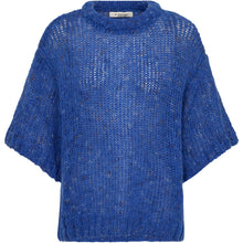 Load image into Gallery viewer, A textural essential with a soft, slouchy feel. Maggie is crafted from a loosely spun melange knit in a relaxed silhouette with short sleeves and dropped shoulders. The wide neckline and slightly cropped length make it easy to layer or wear as is — delivering a casual yet elevated edge to everyday looks.
Size &amp; Fit
• Relaxed fit
• Cropped length
• Dropped shoulders
• True to size
Details
• Soft melange knit
• Short sleeves
• Wide crew neckline
• Lightweight, airy texture