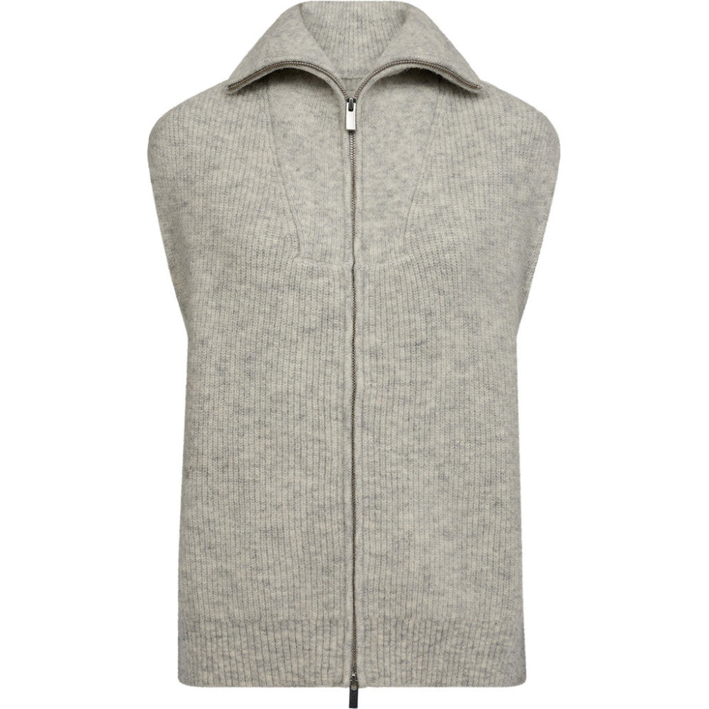 a modern layering piece crafted in a wool blend for a soft, slightly brushed finish. The sleeveless silhouette is detailed with a two-way zip and tall ribbed collar, giving it a clean yet casual look that pairs effortlessly over shirts or knits.
Details
• Sleeveless knitted vest.
• Two-way front zipper.
• High collar.
• Soft and brushed wool blend.
• Ribbed hem and collar.