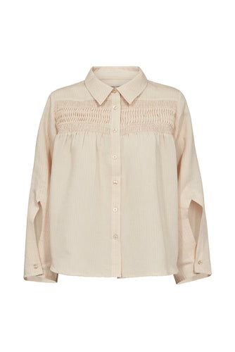 Cassandra Pintuck Velvet Shirt is a refined velvet shirt with a sculptural edge.
Crafted from soft striped velvet, it features delicate pintuck smocking across the chest, adding volume and structure to the relaxed silhouette.
Designed with a rounded collar, buttoned cuffs, and a straight hem