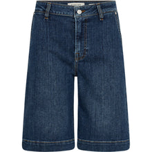 Load image into Gallery viewer, Our Gilly French Shorts are the ultimate warm-weather staple with a cool, contemporary edge. Designed with a flattering high-rise waist and a relaxed, straight-leg fit, these denim shorts strike the perfect balance between structured and laid-back. The longer length adds a touch of sophistication, while the classic five-pocket styling and premium stretch denim ensure everyday comfort and versatility.
Size &amp; Fit
• High-rise waist
• Relaxed straight-leg fit
• Long short length
Details
