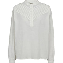 Load image into Gallery viewer, The Wiona Pleat Shirt blends soft structure with romantic detailing. Crafted from a lightweight cotton blend, it features a rounded collar and a pleated yoke that draws the eye to the delicate half-button placket.
The relaxed fit and gently gathered sleeves make it an effortless choice for everyday wear with a refined twist.
Size &amp; Fit
• Relaxed silhouette
• Slightly dropped shoulders
• True to size
Details
• Pleated yoke with tonal buttons
• Stand collar
• Lightweight cotton-blend fabric
• Buttoned cuffs