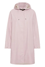 Load image into Gallery viewer, 

A feminine A-shaped under knee raincoat in loose fit. The raincoat has a discreet Ilse Jacobsen Hornbæk logo debossed on left sleeve. The hood is detachable and is attached by a weather proof strap in artificial leather. The style features side pockets with flaps, fancy slits in side seams with press buttons, button closure at wrist and a YKK 2-way zipper at center front. Inside the style has a clean and delicate finish with logo ribbon. Quality is a light and subtle waterproof rubberized PU with polyeste