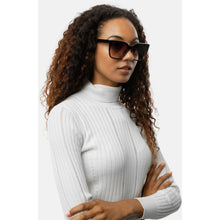 Load image into Gallery viewer, Brown-tinted lenses with a thin frame – subtle and understated design.
• One size
• Tinted glasses
• 100% recycled polycarbonate
• Delivered in a small organic cotton bag