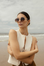 Load image into Gallery viewer, Soft round sunglasses with brown lenses and a clean design-laid back and everyday friendly.

Tinted sunglasses