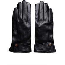 Load image into Gallery viewer, Luly With fleece lining

Luly is a simple, elegant glove featuring a delicate flap detail at the wrist, finished with a button. Timeless, stylish, and feminine.

The gloves are designed in the softest leather, and are lined with delicious soft fleece lining.
When you need to use your smartphone, you can keep the gloves on as the tip of the index finger and thumb has a touch screen function on both the right and left glove. Note that the touch screen function may decrease over time as the gloves become 