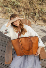 Load image into Gallery viewer, Malou Big is a stylish and practical work bag, designed to carry your daily essentials with ease. It features a spacious main compartment, perfect for keeping everything organized throughout your day. The bag has a comfortable shoulder strap, making it ideal for commuting or working on the go.