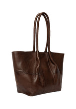 Load image into Gallery viewer, The Mane Small is a stylish shoulder bag designed with elegance and practicality in mind. It features comfortable shoulder straps and a beautiful ruched design running down the front, adding a soft and luxurious touch to its look. The bag has a structured base, allowing it to stand upright on its own. Inside, you&#39;ll find a spacious main compartment with plenty of room for your everyday essentials — perfect for life on the go.