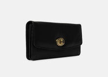 Load image into Gallery viewer, Moa Wallet Big is an elegant and minimalist wallet with thoughtful functionality. Like its smaller counterpart, it features a beautiful gold clasp closure, a zip pocket on the back, and an interior with a zip compartment and two open sections. In addition, it offers dedicated card slots for up to 6 cards, making it both stylish and practical for everyday use.