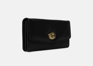 Moa Wallet Big is an elegant and minimalist wallet with thoughtful functionality. Like its smaller counterpart, it features a beautiful gold clasp closure, a zip pocket on the back, and an interior with a zip compartment and two open sections. In addition, it offers dedicated card slots for up to 6 cards, making it both stylish and practical for everyday use.
