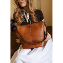 Load image into Gallery viewer, The Nomi bag is a stylish shoulder bag with a removable strap, giving you the flexibility to wear it the way you prefer. It features a clean, minimalist design and a spacious main compartment that provides plenty of room for your everyday essentials.