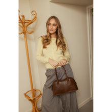 Load image into Gallery viewer, Nynne Big is a beautiful shoulder bag that showcases a stunning shape and an elegant design.
• Handcrafted
• Sturdy, rounded shoulder straps
• Spacious main compartment with zip closure

Type: Shoulder bag
Quality:100% Leather
Dimension: H: 18,5 x W: 35,5 x D: 12,5 cm