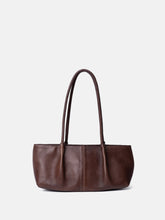 Load image into Gallery viewer, Sille is the perfect little for your essentials.

• Handcrafted
• Two handles
• Zip closure
• Spacious main compartment

This bag is made from our Urban Leather Quality - a milled cow leather that is dyed
before the surface is finalized. This process preserves the leather’s natural texture, leaving each bag with unique characteristics, where no two are the same. After the dye, a light wax is applied, creating a smooth and soft finish.

