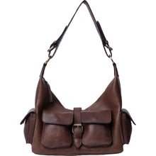 Load image into Gallery viewer, Solvej Medium - a cool shoulder bag in a classic design with lots of pockets.
• Handcrafted
• Two pockets on the front and sides with button closure
• Gold buckle button detail
• Main compartment with zip closure
• Comes with a adjustable, removable crossover strap
• One zip pocket on the back
This bag is made from our Urban Leather Quality - a milled cow leather that is dyed
before the surface is finalized. This process preserves the leather’s natural texture, leaving each bag with unique characteristics, 