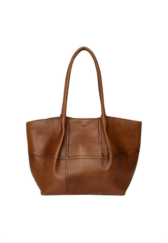 The Mane Big is a stylish workbag designed with elegance and practicality in mind. It features comfortable shoulder straps and a beautiful ruched design running down the front, adding a soft and luxurious touch to its look. The bag has a structured base, allowing it to stand upright on its own. Inside, you'll find a spacious main compartment with plenty of room for your everyday essentials 