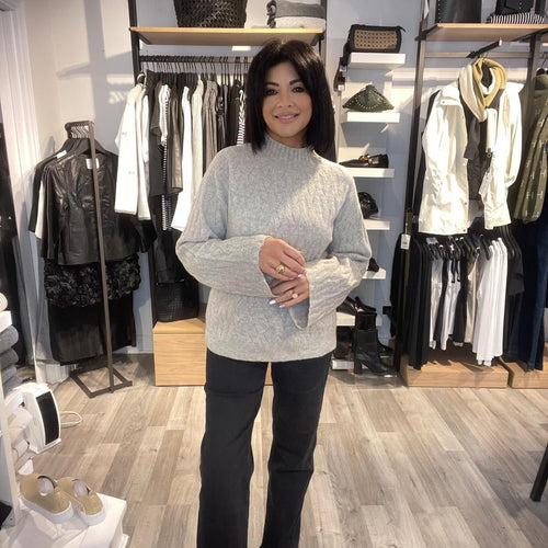 Aimee the label sybe textured knit sweater with wide sleeve.