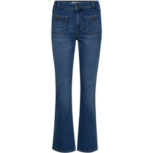 Load image into Gallery viewer, The Jelena 70’s Jeans channel a retro-inspired silhouette with a modern, refined edge. Designed with a mid waist and a subtle kick flare, they create a flattering, elongated line through the leg. Crafted in a soft stretch denim with a classic mid-blue wash, the style is finished with front patch pockets that add a vintage-inspired touch.
Size &amp; Fit
• Mid rise
• Slim fit with kick flare
• Cropped length
• Fitted through hip and thigh
Details
• Front patch pockets with button detail
• Zip and button 